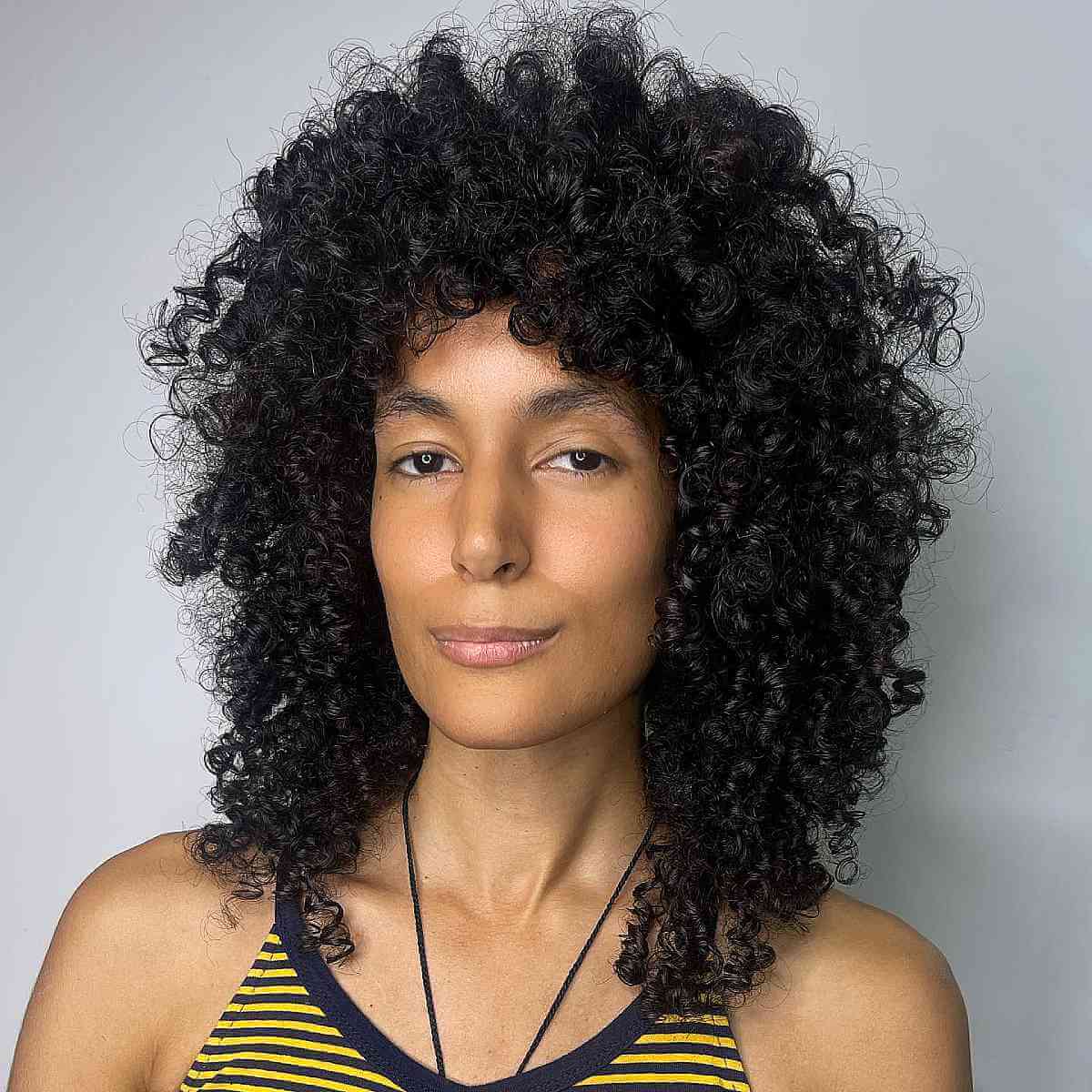 How to Pull Off The Curly Shag Haircut