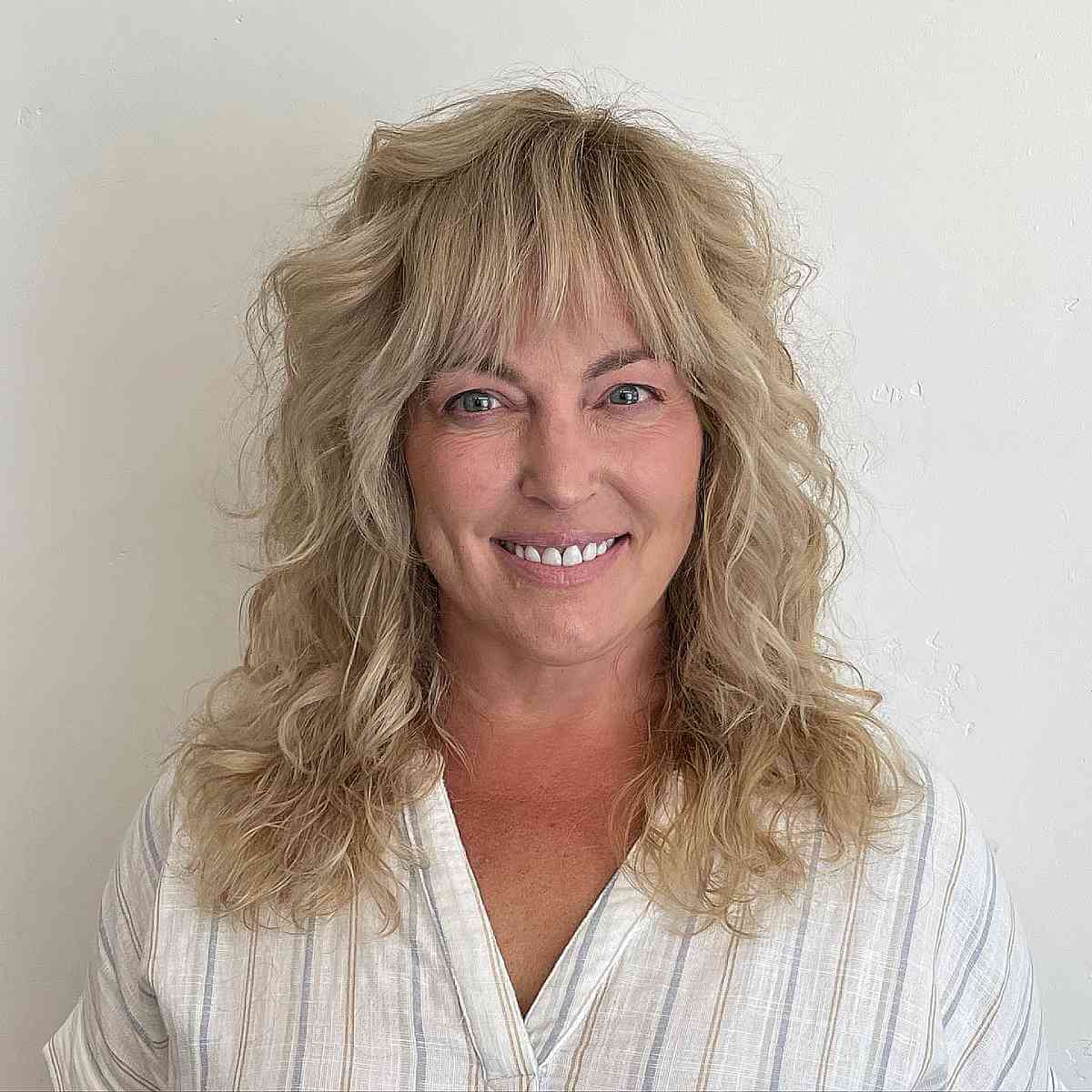 How to Pull Off The Curly Shag Haircut
