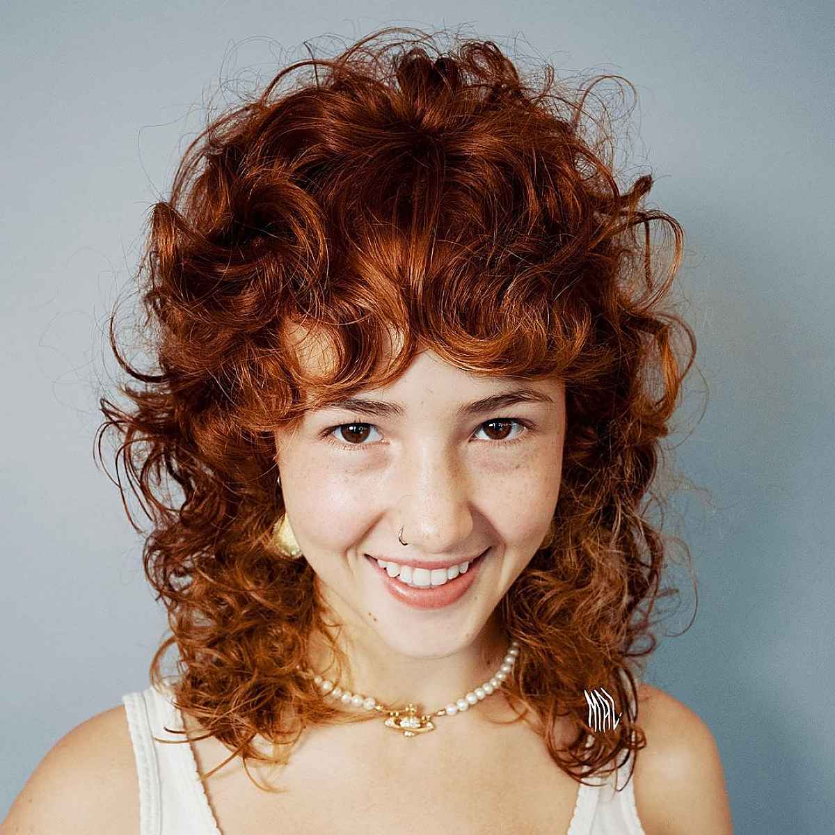 How to Pull Off The Curly Shag Haircut