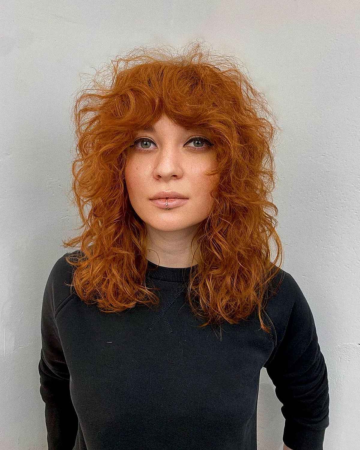 How to Pull Off The Curly Shag Haircut