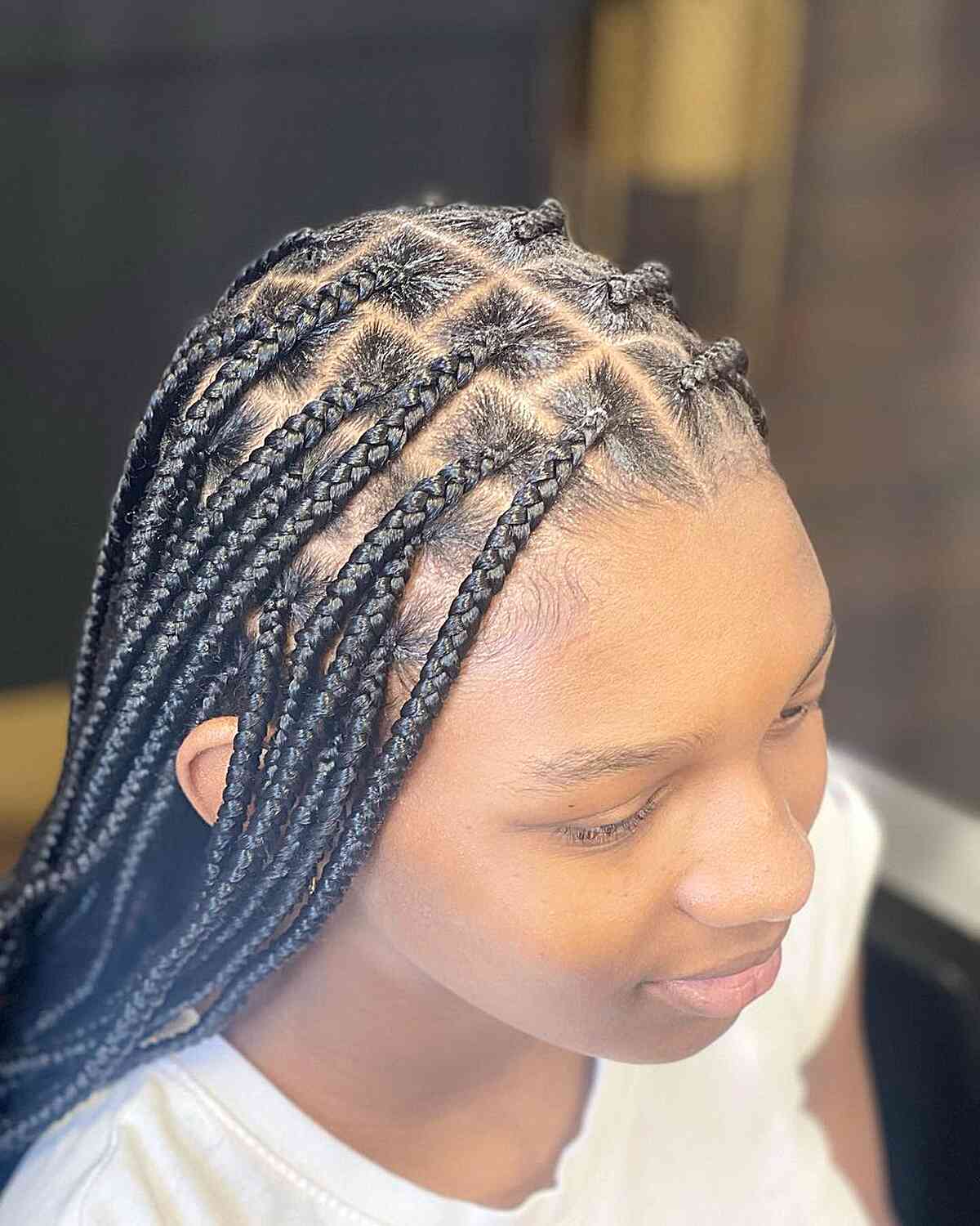 30 Hottest Knotless Box Braids Hairstyles Women of Color Are Getting in 2025