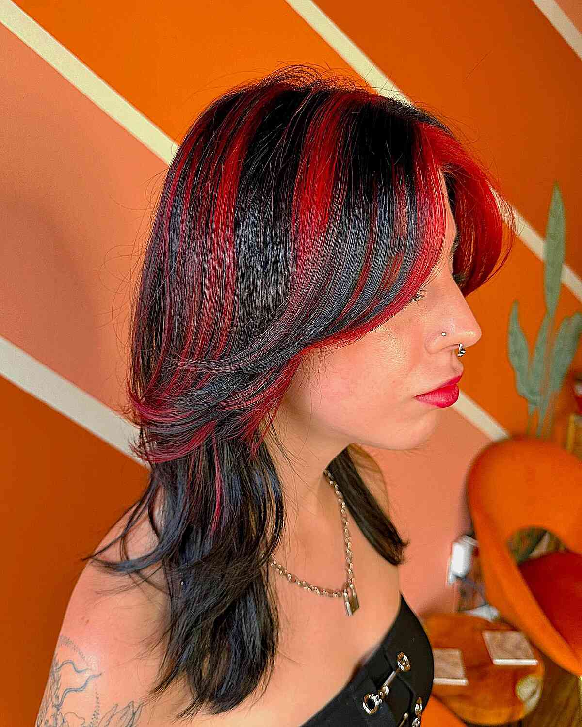 20 Best Black Hair with Red Highlights for Eye-Catching Contrast