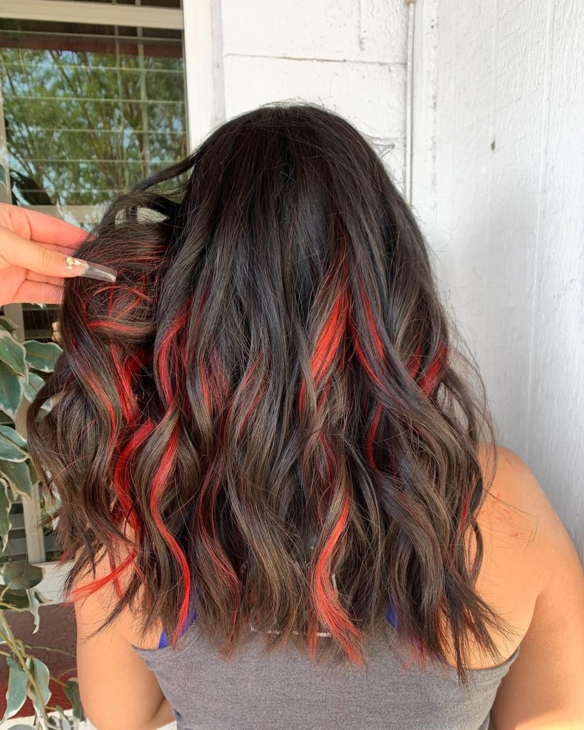 20 Best Black Hair with Red Highlights for Eye-Catching Contrast