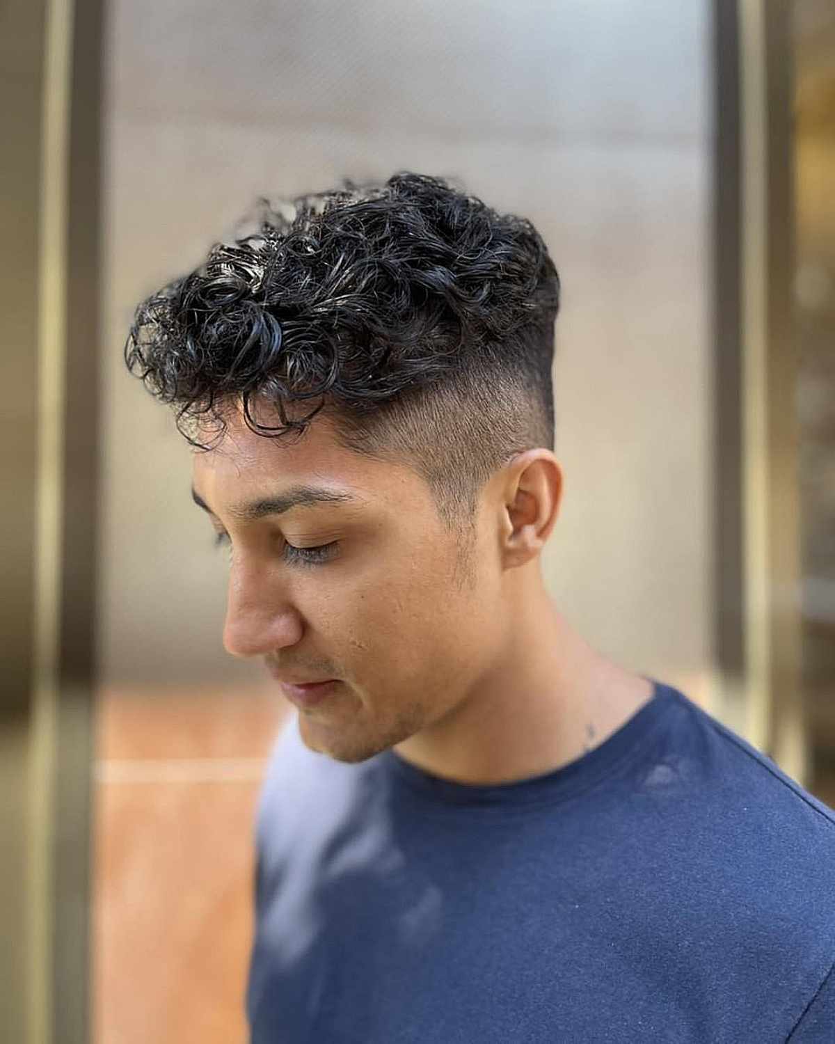 30 Curly Hair Fade Haircuts for Guys in 2025