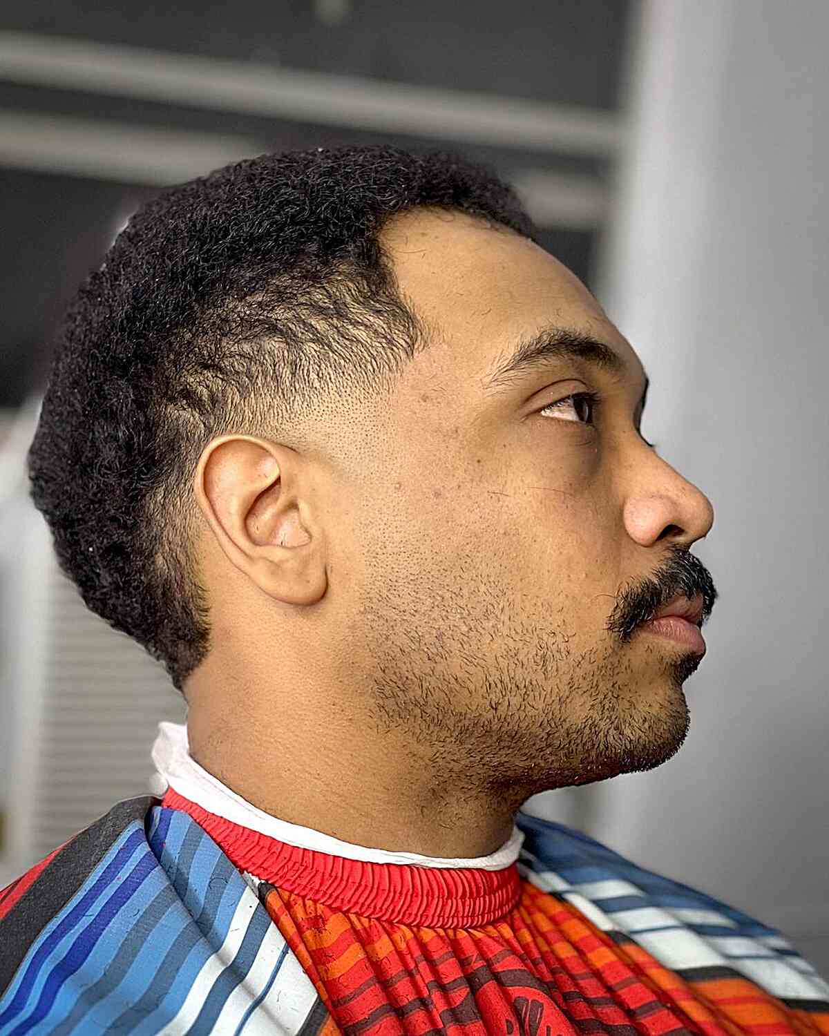 30 Curly Hair Fade Haircuts for Guys in 2025
