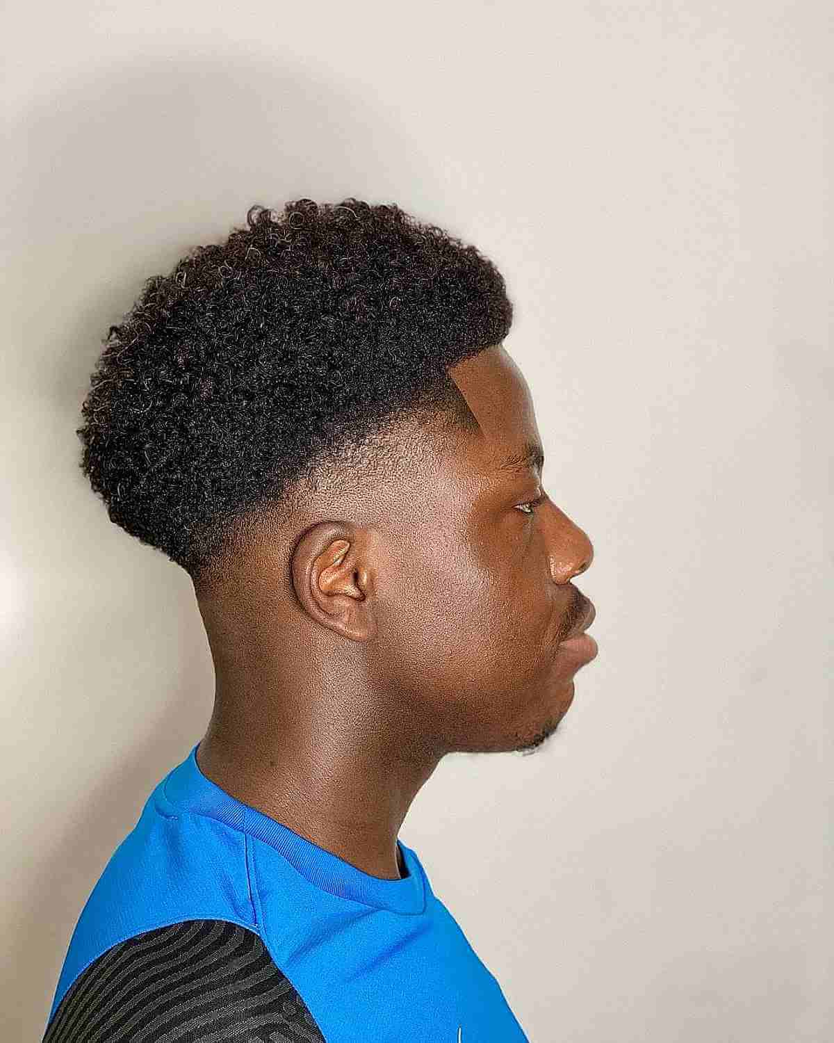 30 Curly Hair Fade Haircuts for Guys in 2025
