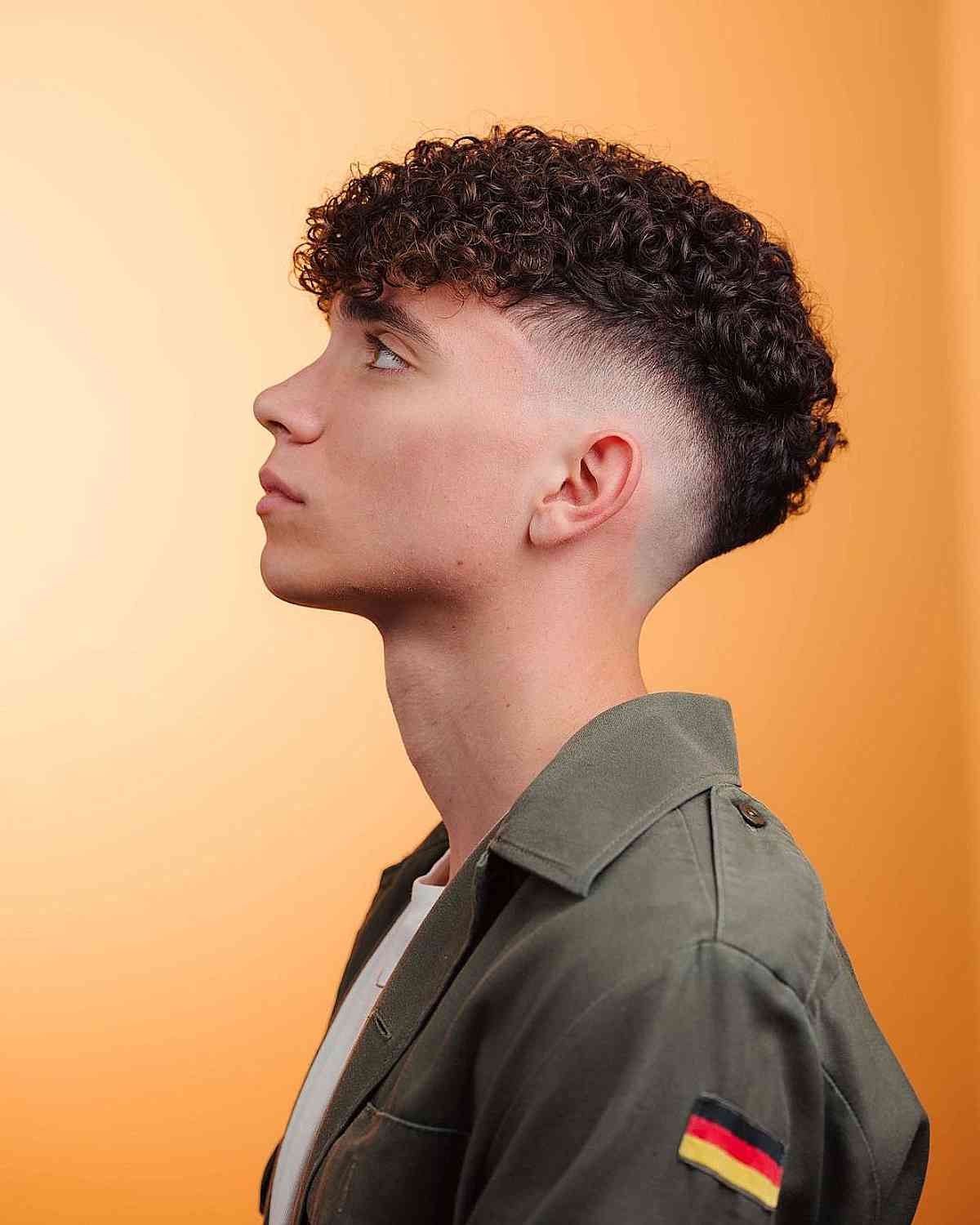 30 Curly Hair Fade Haircuts for Guys in 2025