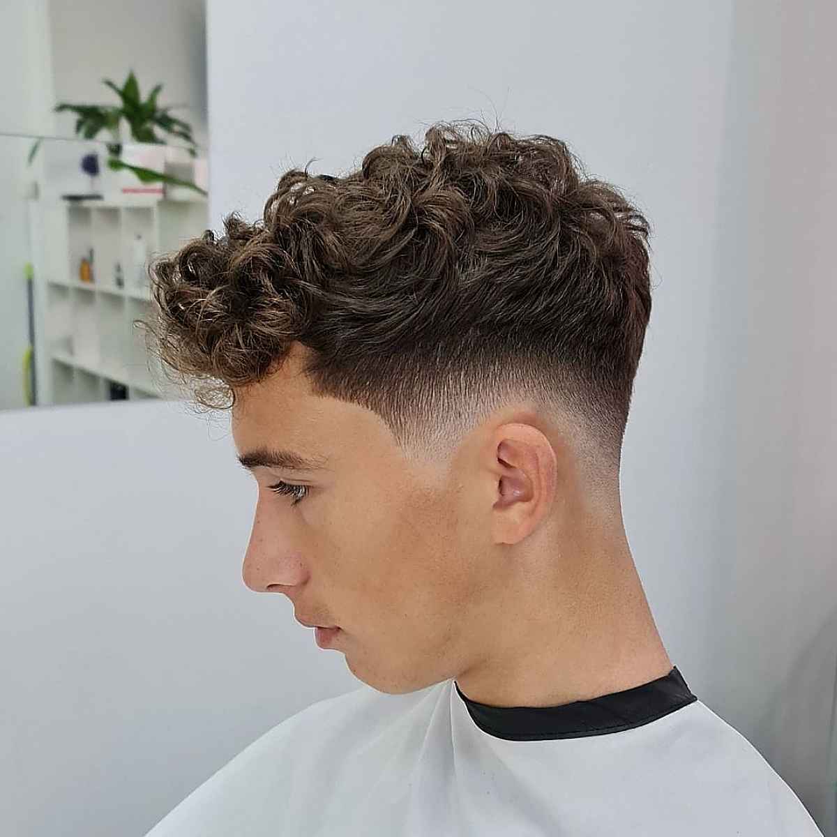 30 Curly Hair Fade Haircuts for Guys in 2025
